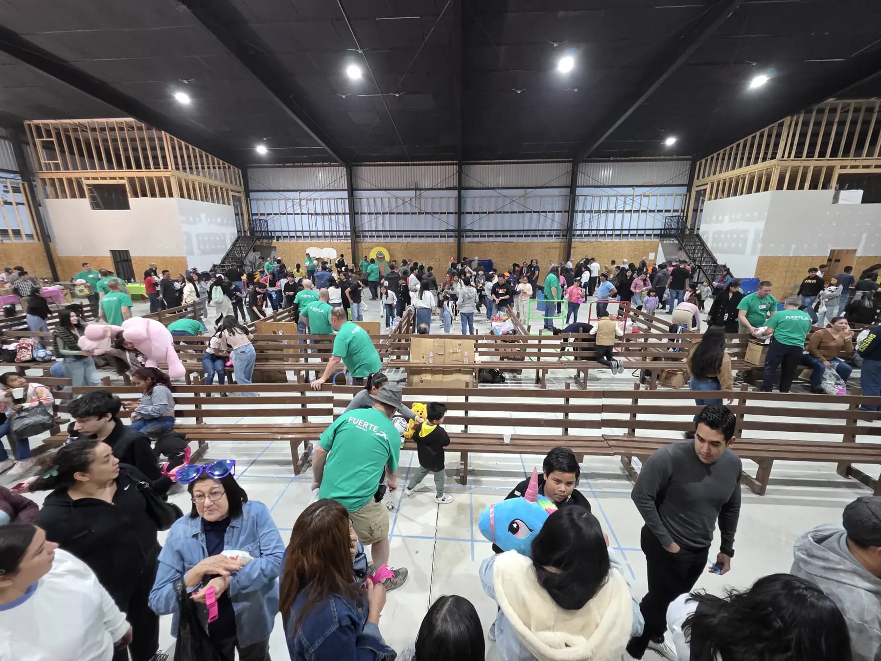 Families and FUERTE team members gathered for a festival service moment