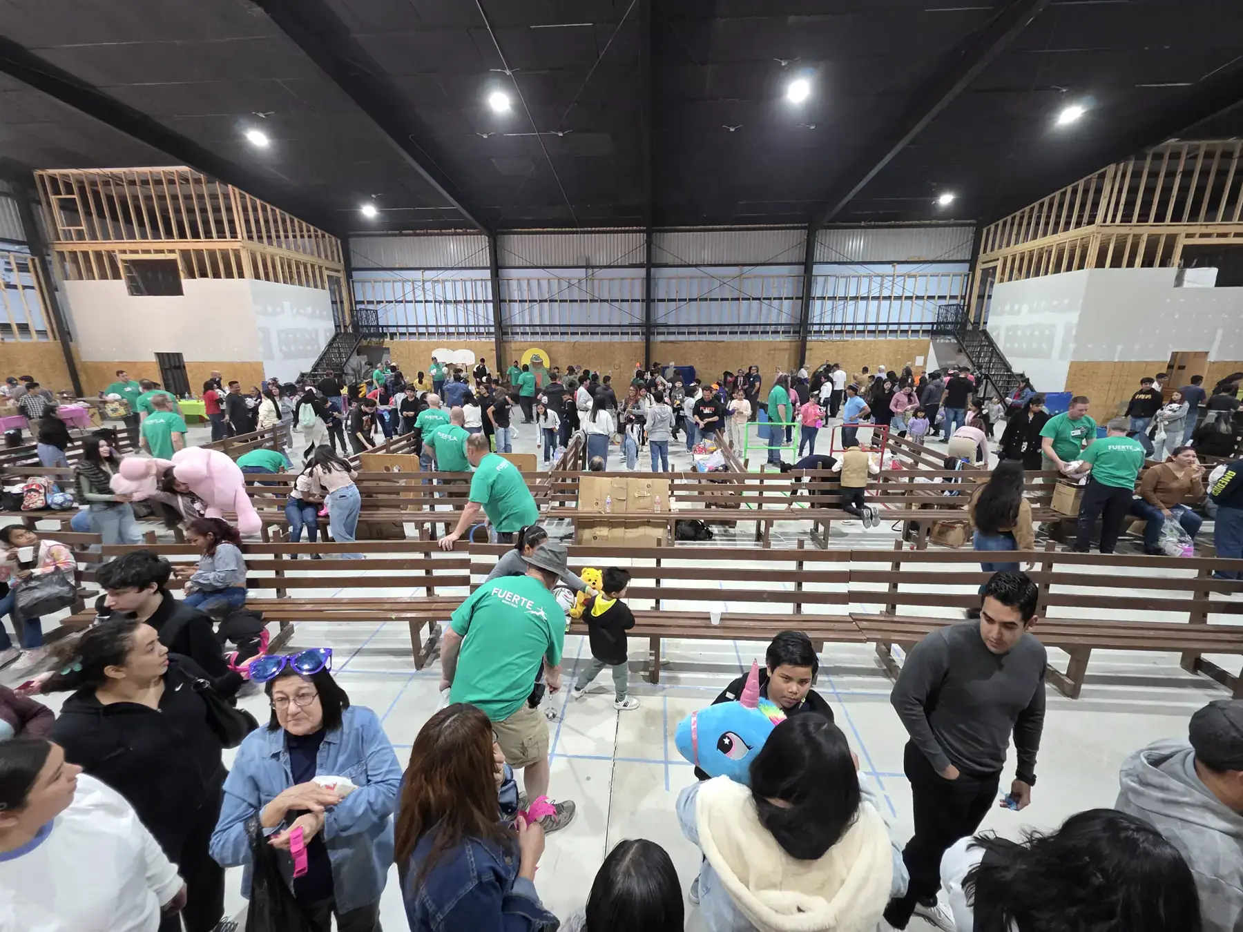 Families and FUERTE team members gathered for a festival service moment